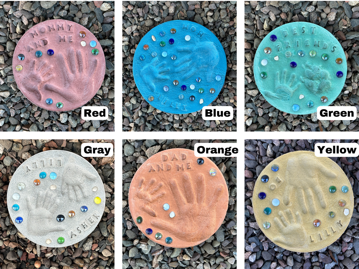 Assortment of colored stepping stones displayed on ground showcasing different designs and colors. Shows the larger sized stones with three hand prints on one stone.  Red, Blue, Yellow, Orange, Green and Grey color options shown in picture. Mama B's