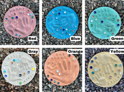 Colored stepping stones displayed over garden stone.  Colors include red, blue, green, gray, orange, and yellow.  Pick your color and have fun! 